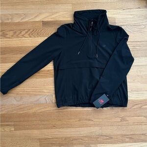 Women’s New Balance Cropped Wind Runner